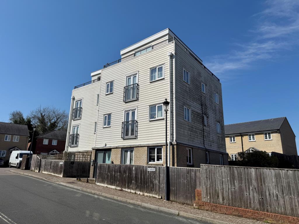Lot: 167 - FLAT WITH WRAPAROUND BALCONY AND PARKING FOR INVESTMENT - A View of the Block from an Alternative Angle